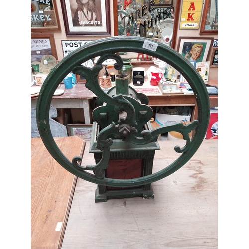 421 - 19th C. metal coffee grinder with original green paint. {74 cm H x 59 cm W x 50 cm D}.