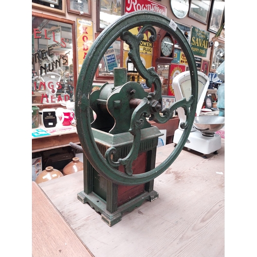 421 - 19th C. metal coffee grinder with original green paint. {74 cm H x 59 cm W x 50 cm D}.