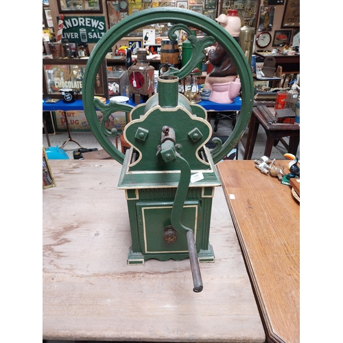 421 - 19th C. metal coffee grinder with original green paint. {74 cm H x 59 cm W x 50 cm D}.