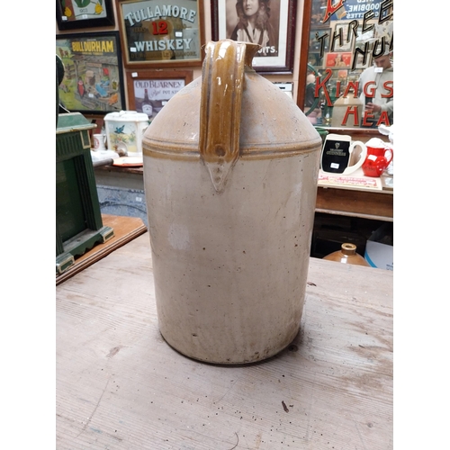 424 - 19th C. Stoneware whiskey flagon in original basket {45cm H x 30 cm Dia.} and another without basket... 