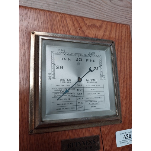 426 - Guinness barometer. {22 cm h x 22 cm W}.