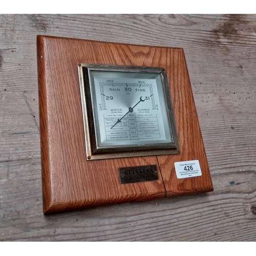 426 - Guinness barometer. {22 cm h x 22 cm W}.