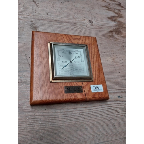 426 - Guinness barometer. {22 cm h x 22 cm W}.