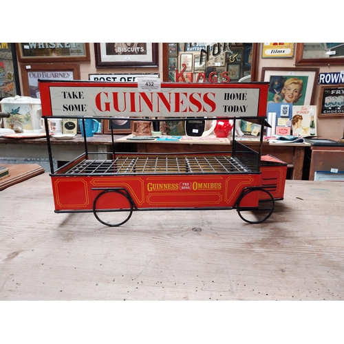 432 - Guinness advertising tinplate bottle crate in the form of a Bus. {27 cm H x 47 cm W x 23 cm D}.