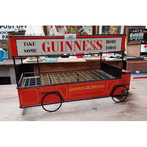 432 - Guinness advertising tinplate bottle crate in the form of a Bus. {27 cm H x 47 cm W x 23 cm D}.