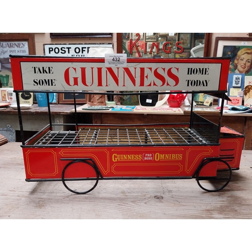 432 - Guinness advertising tinplate bottle crate in the form of a Bus. {27 cm H x 47 cm W x 23 cm D}.