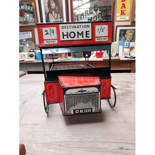 432 - Guinness advertising tinplate bottle crate in the form of a Bus. {27 cm H x 47 cm W x 23 cm D}.