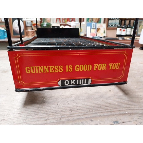 432 - Guinness advertising tinplate bottle crate in the form of a Bus. {27 cm H x 47 cm W x 23 cm D}.