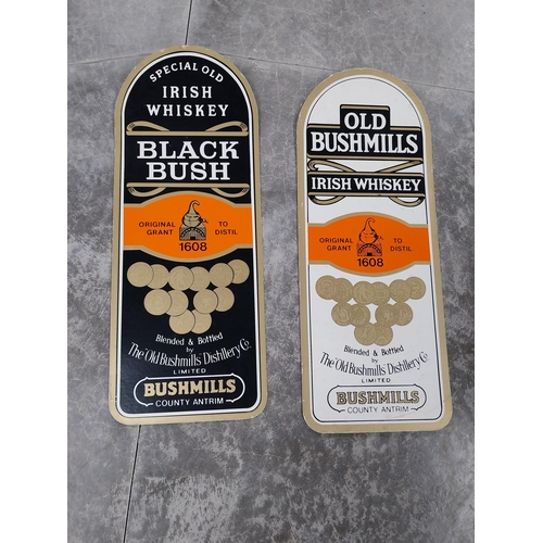 445 - Two Old Bushmills Irish Whiskey showcards. {77 cm H x 30 cm W}.