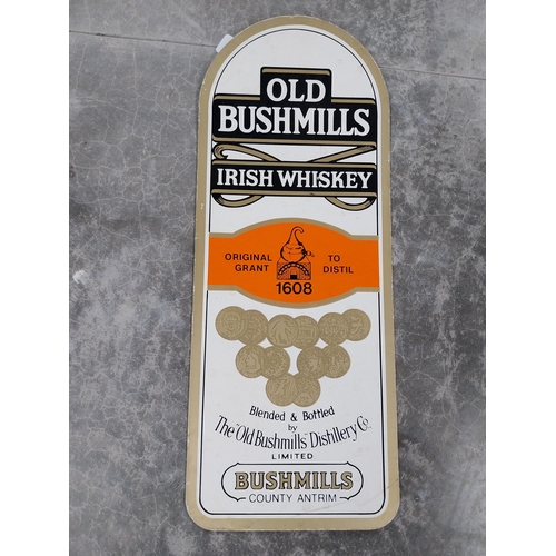 445 - Two Old Bushmills Irish Whiskey showcards. {77 cm H x 30 cm W}.