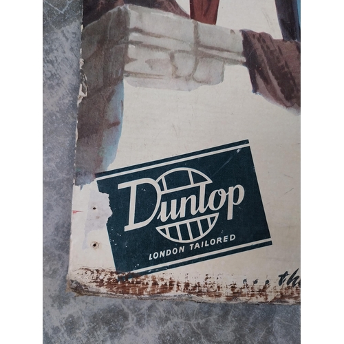 446 - Dunlop Clothing Signature of Style cardboard showcard. {50 cm H x 37 cm W}.