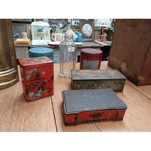 449 - Two Cow and Gate advertising tins, two Biscuit tins, Tea tin and Soda Siphon. {29 cm H and 6 cm H}.