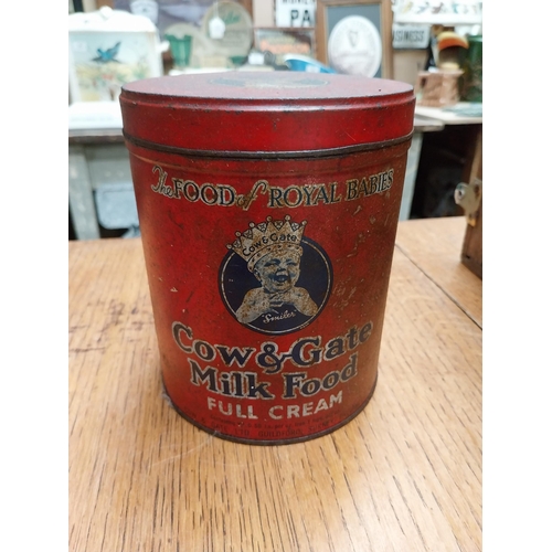 449 - Two Cow and Gate advertising tins, two Biscuit tins, Tea tin and Soda Siphon. {29 cm H and 6 cm H}.