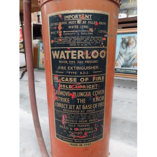 454 - 1940's Waterloo Fire Extinguisher. {54 cm H x 17 cm Dia.}