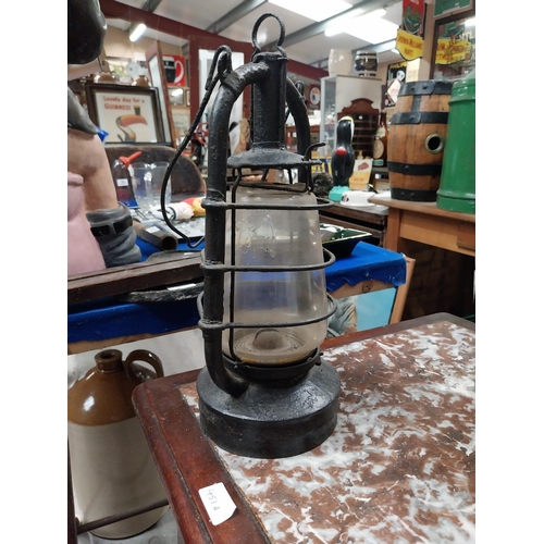 457 - Brass and metal Tilly lamp and two Hurricane lamps. {33 cm H x 16 cm Dia. and 25 cm H x 14 cm Dia.}.