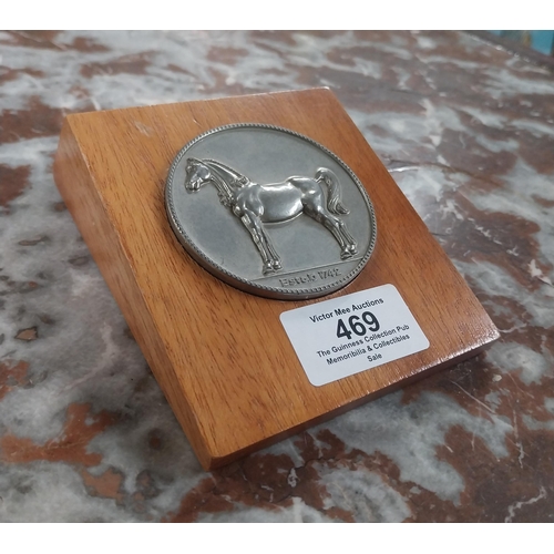 469 - Coin specially struck in Great Britain for White Horse Distillers Ltd mounted on wooden presentation... 