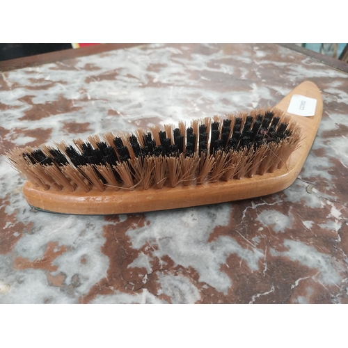 473 - Harp Boomerang Clothes Brush. {4 cm H x 27 cm W}.