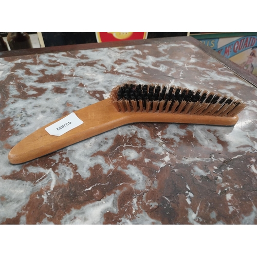 473 - Harp Boomerang Clothes Brush. {4 cm H x 27 cm W}.