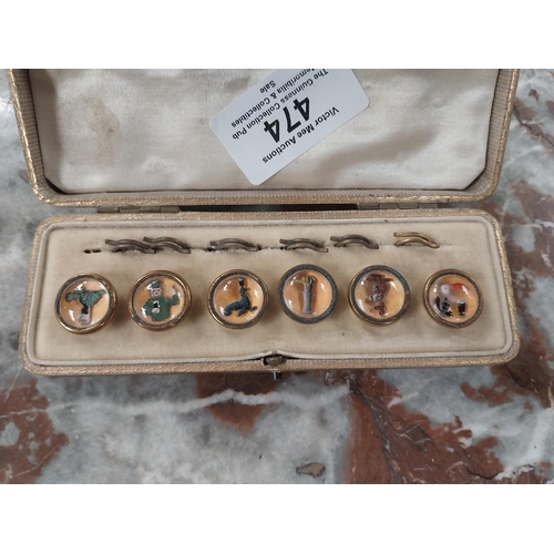 474 - Guinness Cuff links set in box. {2 cm H x 12 cm W x 4 cm D}.