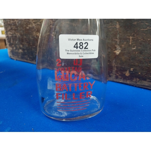 482 - Glass Lucas Battery filler advertising bottle. {18 cm H x 8 cm W} .