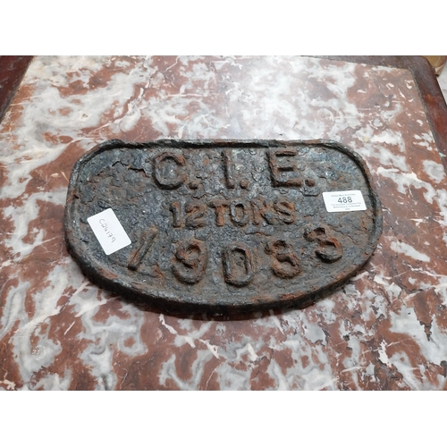 488 - Cast iron CIE plaque. {16 cm H x 28 cm W}.