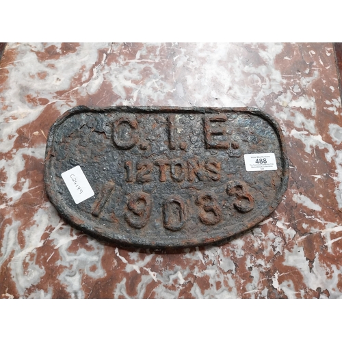 488 - Cast iron CIE plaque. {16 cm H x 28 cm W}.