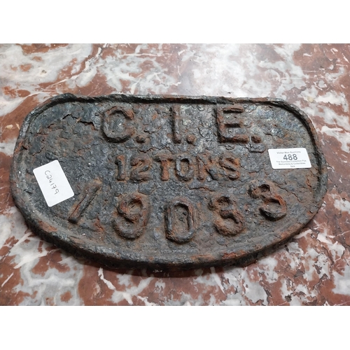 488 - Cast iron CIE plaque. {16 cm H x 28 cm W}.