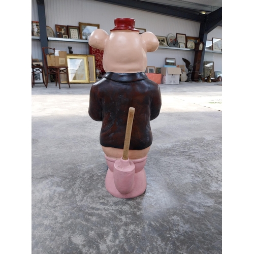 489 - Plastic model of seated Pig. {73 cm H x 32 cm W x 34 cm D}.