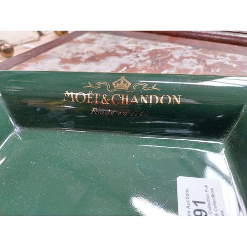 491 - Moet and Chandon {4 cm H x 20 cm W x 16 cm D} ceramic ashtray and John Smith's ceramic ashtray {3 cm... 