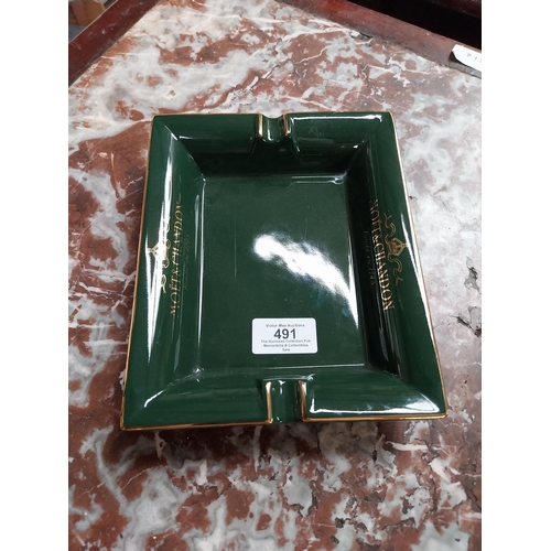 491 - Moet and Chandon {4 cm H x 20 cm W x 16 cm D} ceramic ashtray and John Smith's ceramic ashtray {3 cm... 