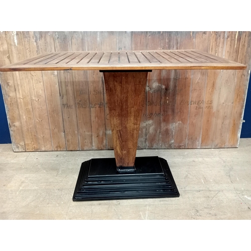 500 - Cast iron stepped drink stand high table with Iroka top and four iron high stools with leather seats... 