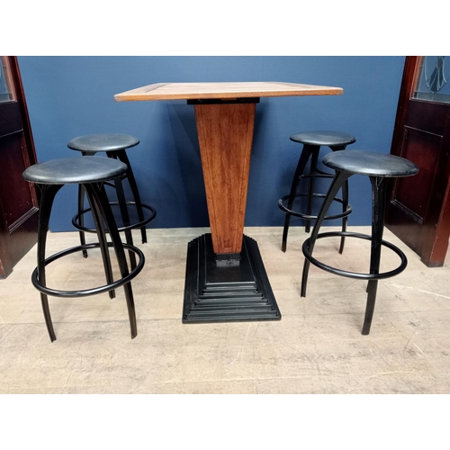 500 - Cast iron stepped drink stand high table with Iroka top and four iron high stools with leather seats... 