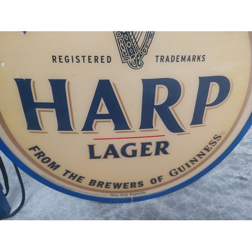 513 - Harp Lager metal and Perspex double sided light up advertising sign {54 cm H x 53 cm W }.