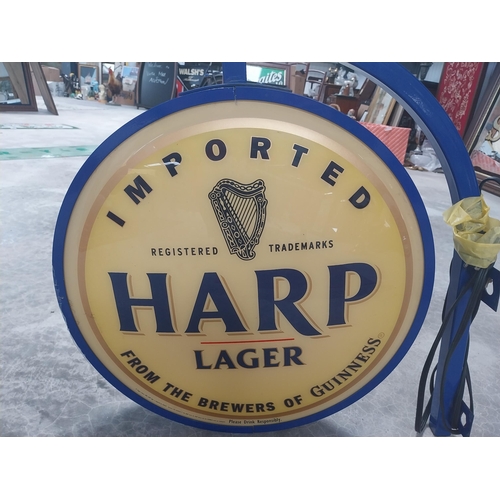 513 - Harp Lager metal and Perspex double sided light up advertising sign {54 cm H x 53 cm W }.