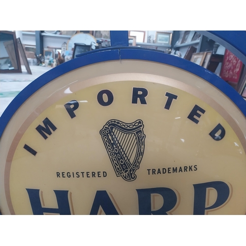 513 - Harp Lager metal and Perspex double sided light up advertising sign {54 cm H x 53 cm W }.