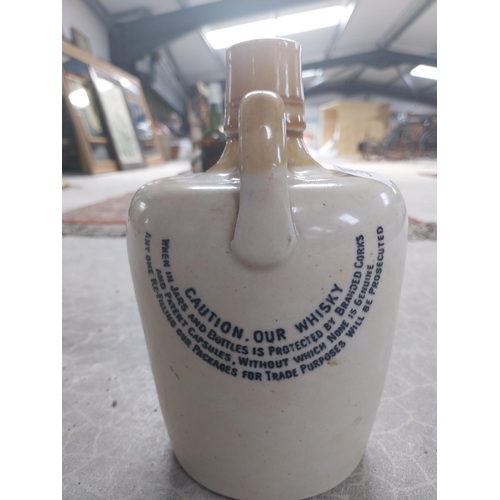 519 - Cruiskeen Lawn Mitchell's Old Irish Whisky advertising stoneware flagon {18 cm H x 11 cm W x 12 cm D... 