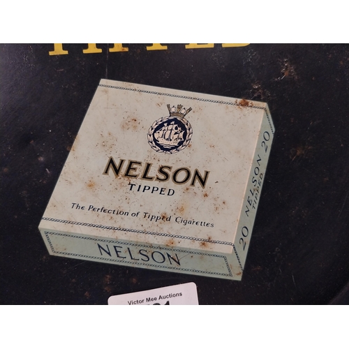 521 - Nelson Tipped Cigarettes tin plate advertising tray. {23 cm Dia.}.