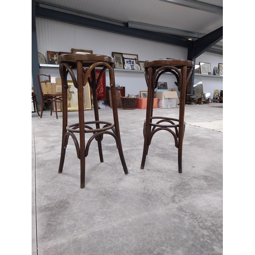 528 - Two bentwood bar stools. {80 cm H x 37 cm Dia.}