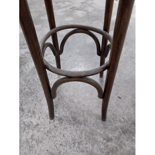 528 - Two bentwood bar stools. {80 cm H x 37 cm Dia.}