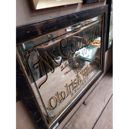 53 - McConnell's Old Irish Whisky Belfast framed advertising mirror. {43 cm H x 64 cm  W}.