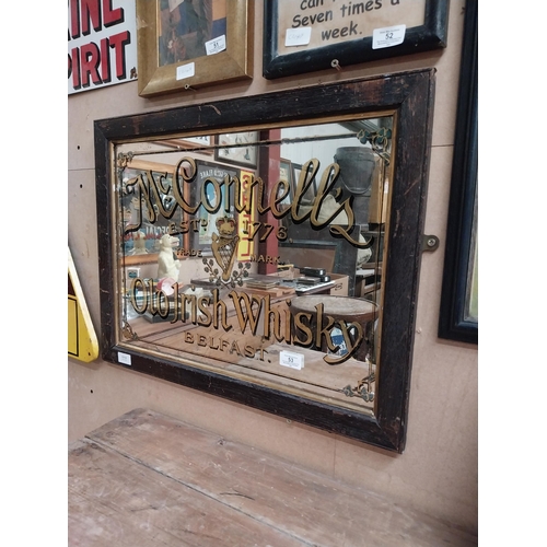 53 - McConnell's Old Irish Whisky Belfast framed advertising mirror. {43 cm H x 64 cm  W}.