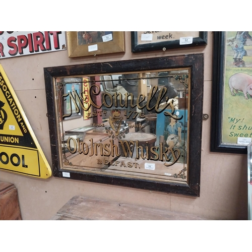 53 - McConnell's Old Irish Whisky Belfast framed advertising mirror. {43 cm H x 64 cm  W}.