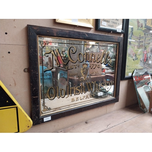 53 - McConnell's Old Irish Whisky Belfast framed advertising mirror. {43 cm H x 64 cm  W}.