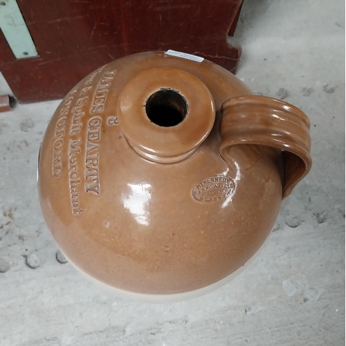 533 - James Gearty Wine and Spirit Merchant Longford three gallon stoneware flagon. {40 cm H x 26 cm Dia.}... 