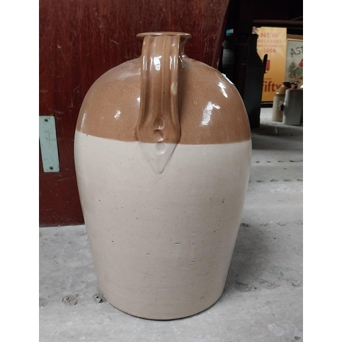 533 - James Gearty Wine and Spirit Merchant Longford three gallon stoneware flagon. {40 cm H x 26 cm Dia.}... 