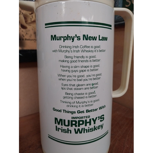 54 - Murphys Irish Whiskey flask. {27 cm H x 18 cm Dia.}.