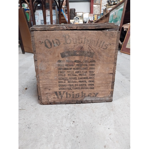 541 - Old Bushmills Whiskey wooden bottle crate. {29 cm H x 28 cm W x 29 cm W}.