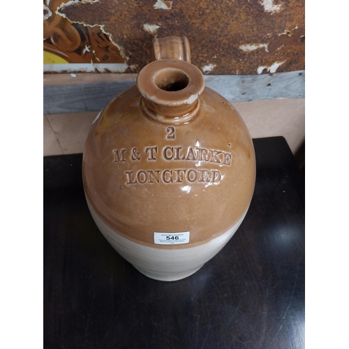 546 - M and T Clarke Longford two gallon stoneware flagon. {38 cm H x 20 cm Dia.}.