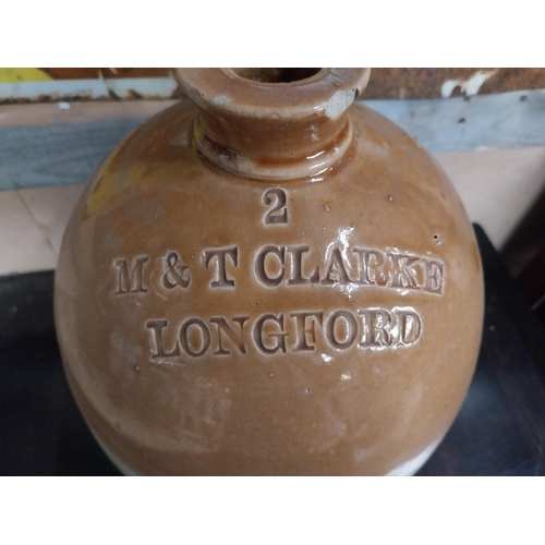 546 - M and T Clarke Longford two gallon stoneware flagon. {38 cm H x 20 cm Dia.}.