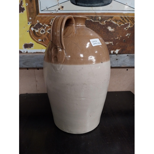 546 - M and T Clarke Longford two gallon stoneware flagon. {38 cm H x 20 cm Dia.}.